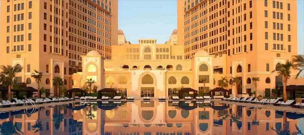 St. Regis Doha Pool. The hotel will welcome collectors, artist and art lovers to the Art Basel Qatar 2026