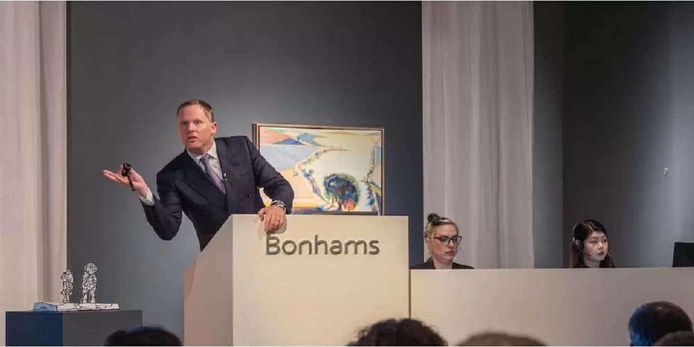 The auctioneer at work during the Bonhams art auction week during the 20th and 21st century art events.