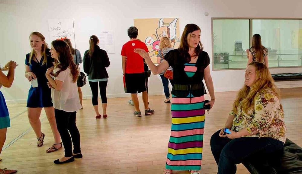 Guests at Let's Grow Old and Colorful Together opening reception. Their smiles are reminders of why museum and gallery art exhibitions are great for relaxation and stress relief.