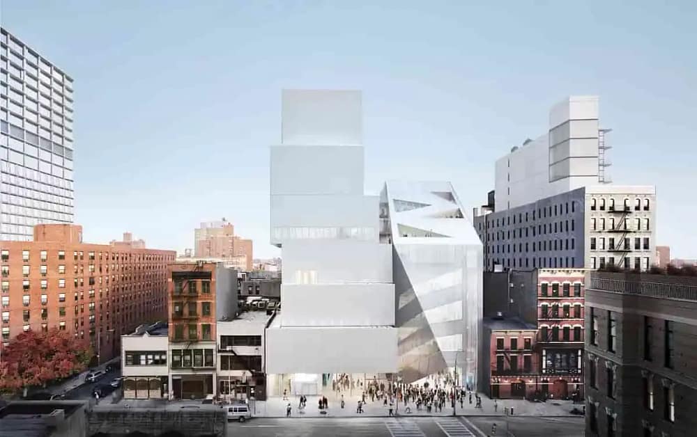 New Museum Reopening ground-floor lobby and new restaurant featuring modern furniture and street-facing windows.