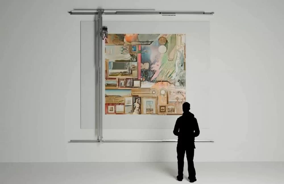 A figure stands in front of Untitled Robot Painting by Alexander Reben. The colorful abstract includes shapes and images. This Artificial Intelligence Art will feature prominently in Christie's AI art auction