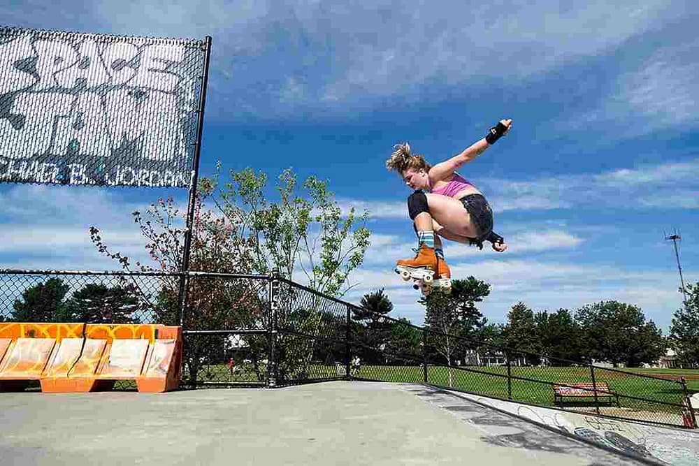 Sophie Kluckhuhn, one of the amazing women roller skating around Baltimore takes flight