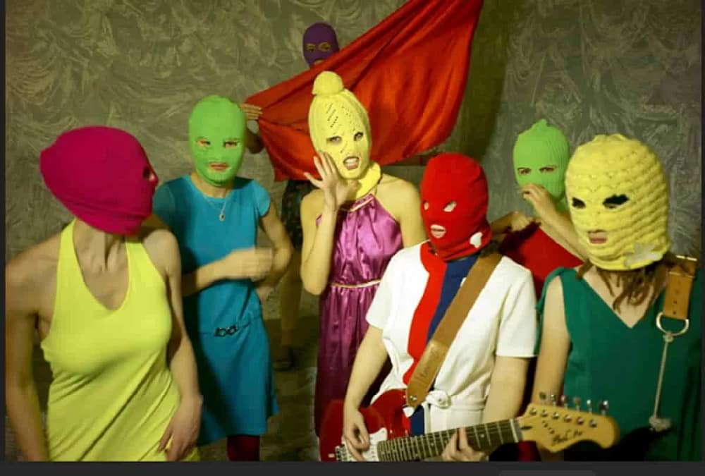 Russia bans Pussy Riot, a feminist punk group, labeling it "extremist." Here, members of the group perform.
