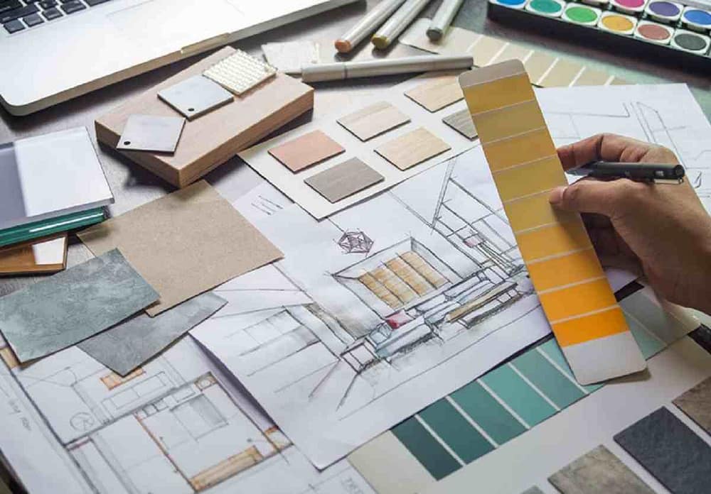 An artist showing how to use a triadic color scheme in art