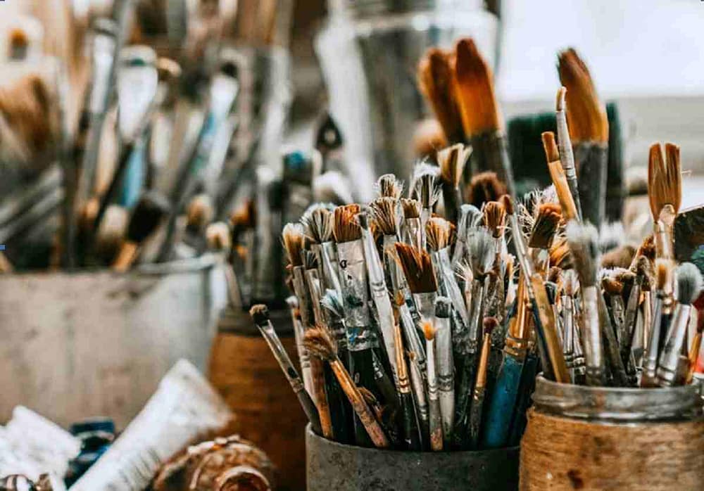 Paint and brushes. What are the advantages of a Shipping Container Art Studio?