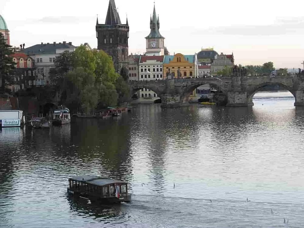 View of a beautiful landscape from photograph of sightseeing taken for the ferry-along-Charles-Bridge. Using some the must-have travel apps for sightseeing can take you to these great places.