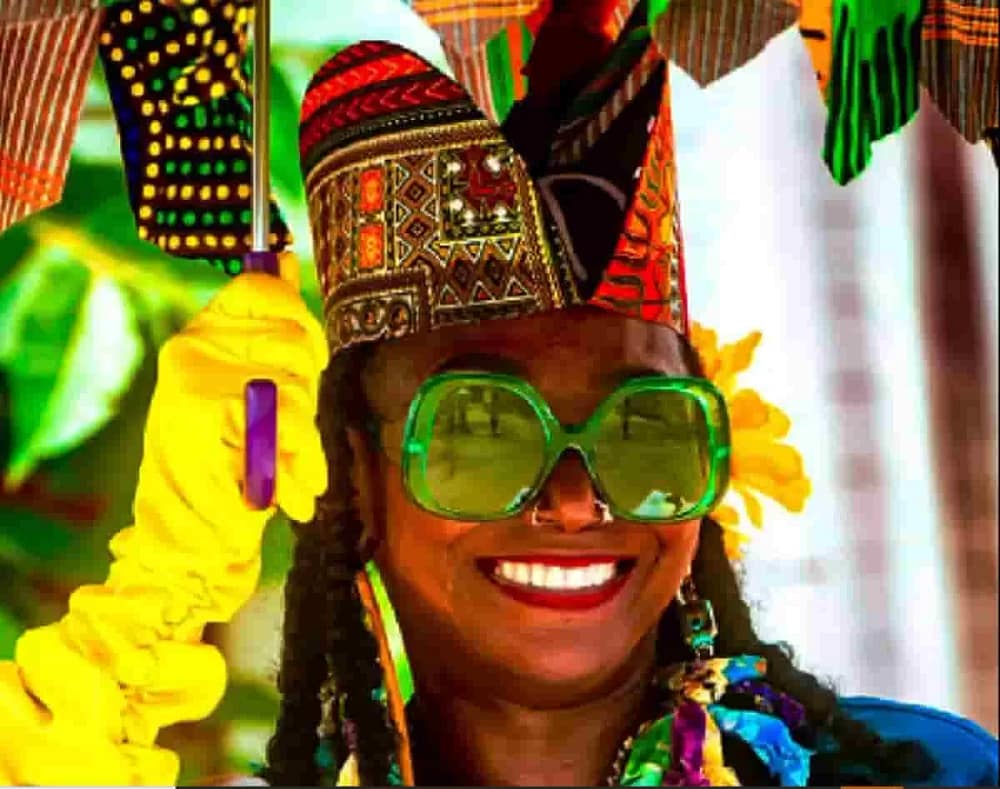 A well-dressed performer at the Voices of History Street Fair having fun.
