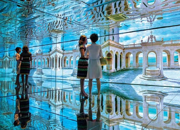 Michelle Obama and Mrs. Agnese Landini in a conversation as they tours the Mirror Room in the Italian Pavilion at the Milan Expo 2015 in Milan, Italy