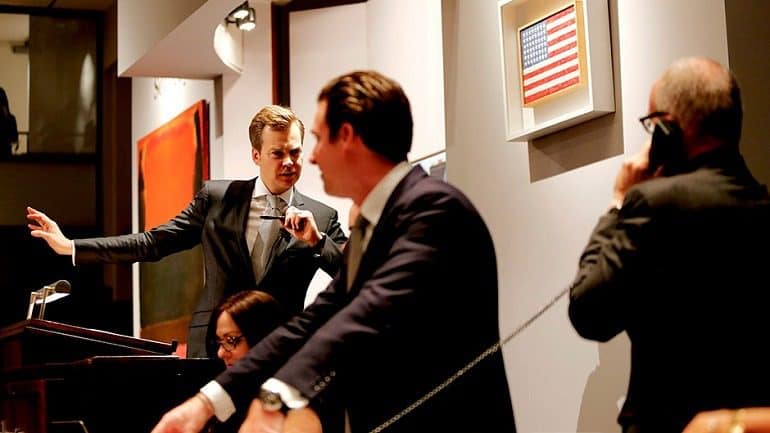 Image: Sotheby’s auctioneers auction Jasper Johns’s 1983 Flag during Contemporary Art Evening auction in the 2014 Auction Season