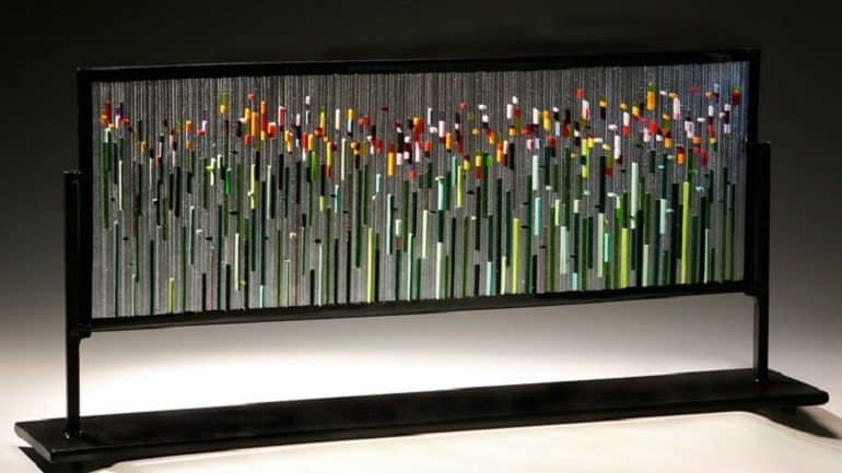 Image: Sculptural glass art titled 'Tulip Fields' by glass artist Ernest Porcelli at the American Craft Council Show