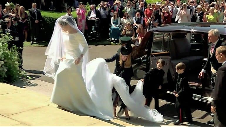 Image: Meghan Markle arriving at the St. George’s Chapel in a wedding gown designed by Givenchy, which continues to dominate discussions in the fashion world