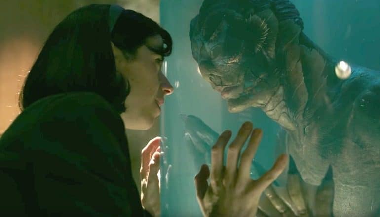 Image: The woman looks into the eye of the mysterious, scaled humanoid-amphibian creature in The Shape Of Water, the movie that won Best Picture at the Academy Award winners