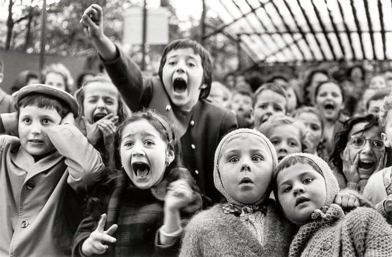 Image: Alfred Eisenstaedt's Children at a Puppet Theatre, Paris, 1963, captures childhood excitements and innocence