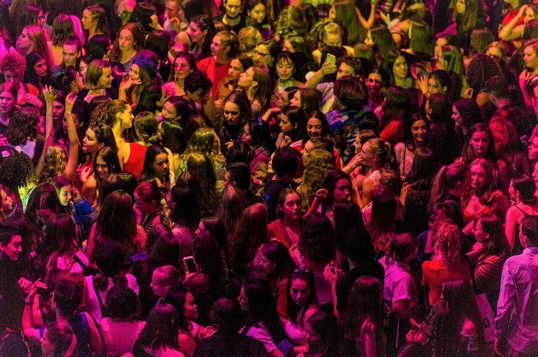 Image: Teenagers celebrating and dancing at a recent Teens Art Party at the National Gallery of Victoria