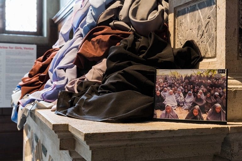 Image: Patricia Cronin, Shrine for Girls, Venice, Hijabs and Photograph, 2015, highlight violence against girls and women