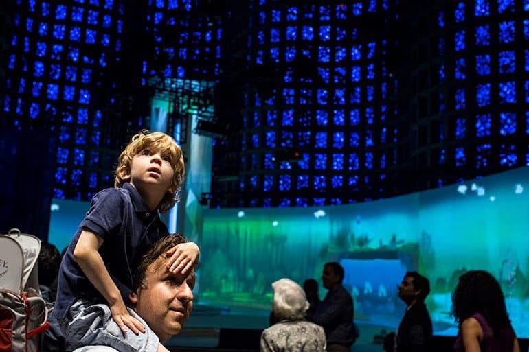 Image: New York visitors admiring 'Connected Worlds' inside the Great Hall designed by Ennead Architects -News