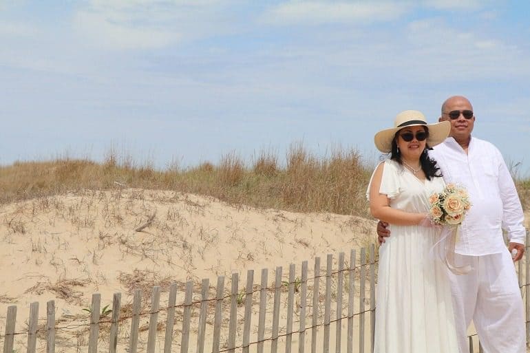 Image: At the Lewes Beach in Delaware Dennis and Lilibeth Datu celebrate their 25th wedding anniversary