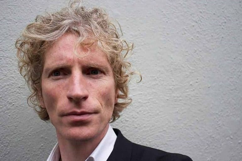 Image: Portrait photograph of Brian Cass the new Senior Curator of Hayward Gallery Touring at Southbank Centre