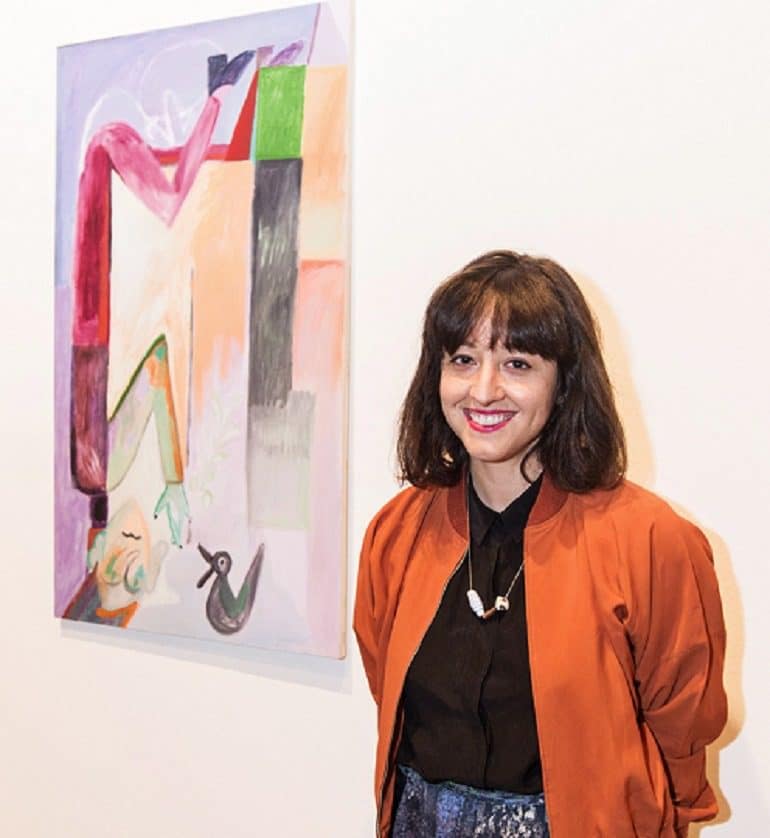 Image: Tiziana La Melia, winner of the Annual RBC Canadian Painting Competition with Hanging on to the Part, the painting that won the art competition